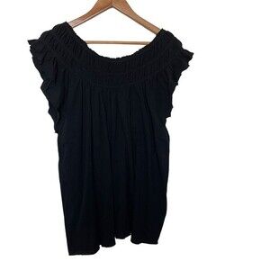 NWT Free People Coconut Top. Worn on or off shoulder. Black. Size L.